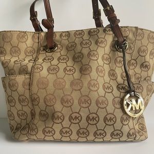 Michael Kors bag featuring an all-over Michael Kors logo